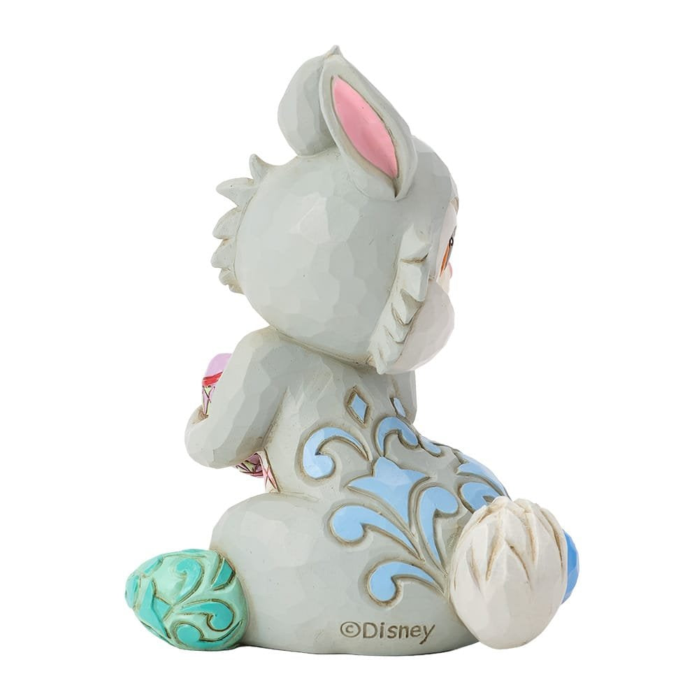 Disney Traditions Stampertje met paaseieren figurine, sfeervolle paasdecoratie voor Disney fans en verzamelaars.