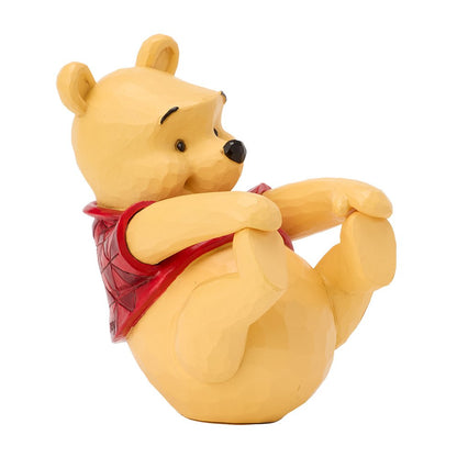 Speels Disney Traditions Winnie the Pooh wiebelbeeldje met klassieke Disney stijl en gedetailleerde afwerking.