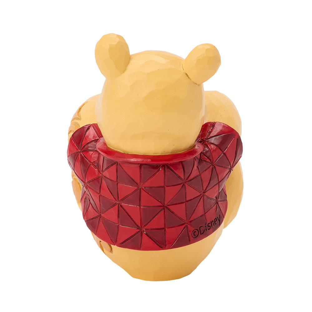 Disney Traditions Winnie the Pooh beeldje met wiebel effect en warme kleuren, ontworpen door Jim Shore.