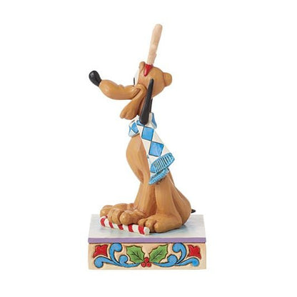 Feestelijk Pluto-beeldje ontworpen door Jim Shore, perfect voor Disney-verzamelaars en kerstdecoratie.